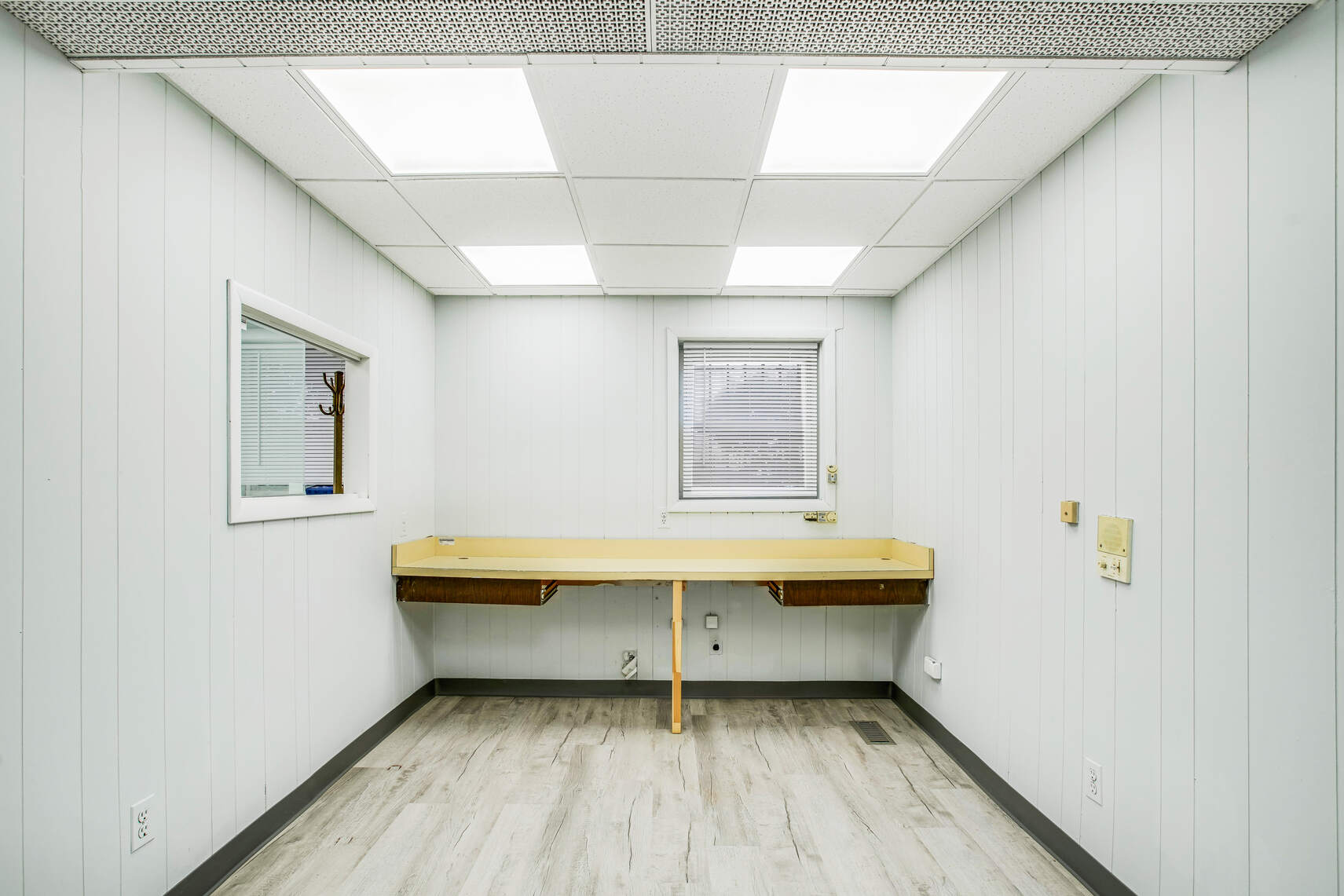 8301 4th Avenue Brooklyn, NY 11209 - Photo 15 of 20 a view of a room with wooden floor and window