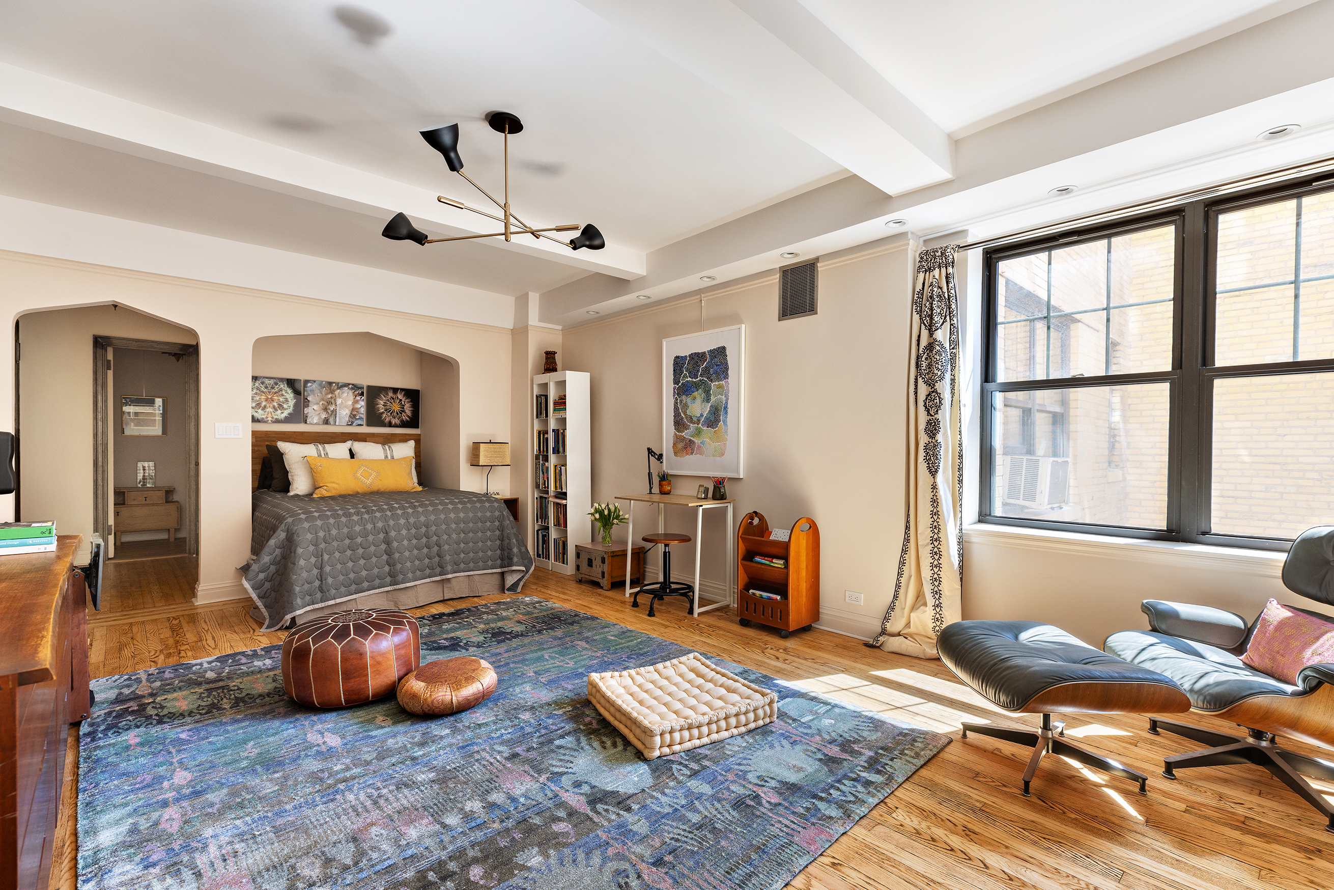 200 East 16th Street, Unit 5LM Manhattan, NY 10003 - Photo 4 of 16 a living room with furniture and wooden floor