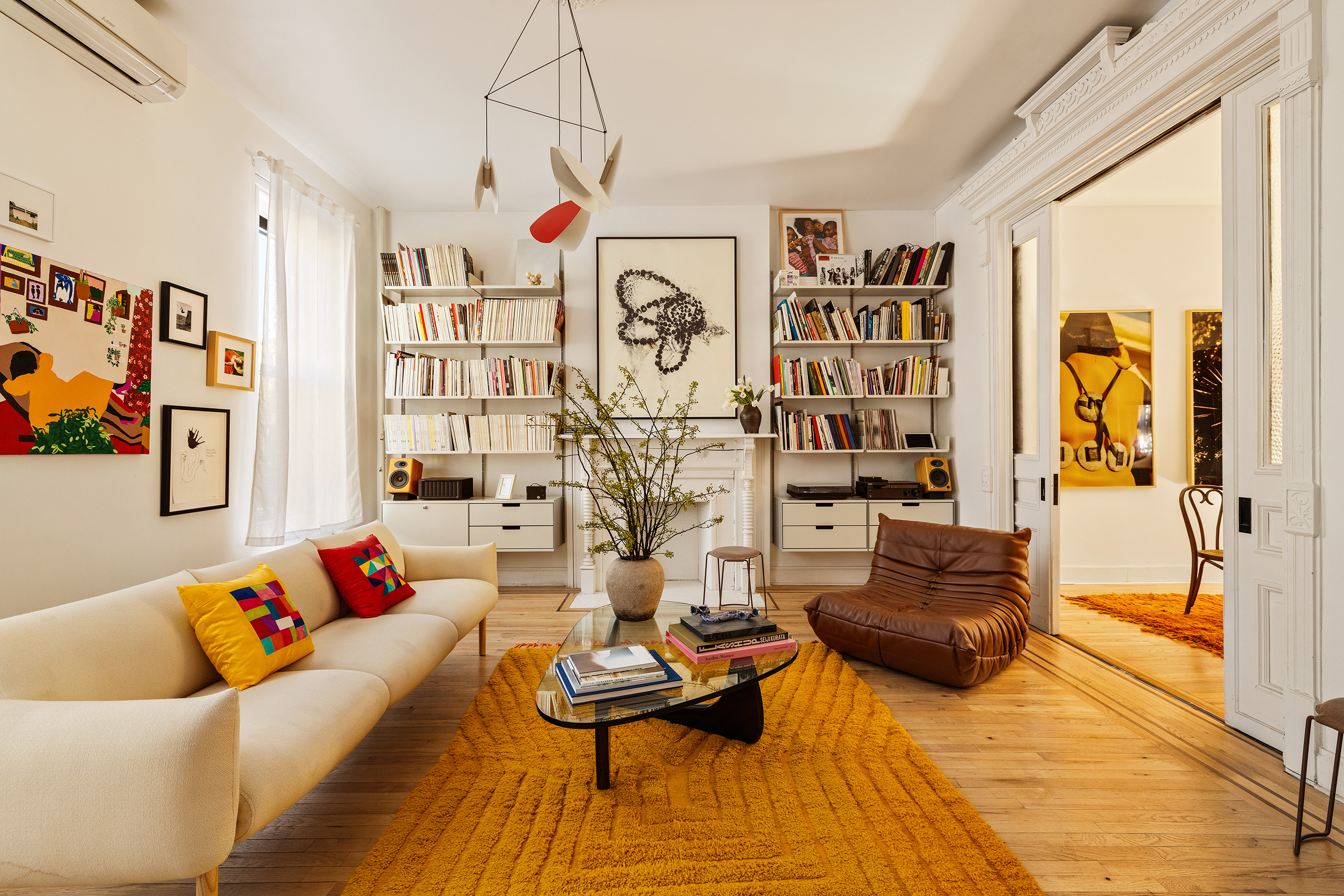 679 Putnam Avenue Brooklyn, NY 11221 - Photo 4 of 27 a living room with patio furniture and white walls