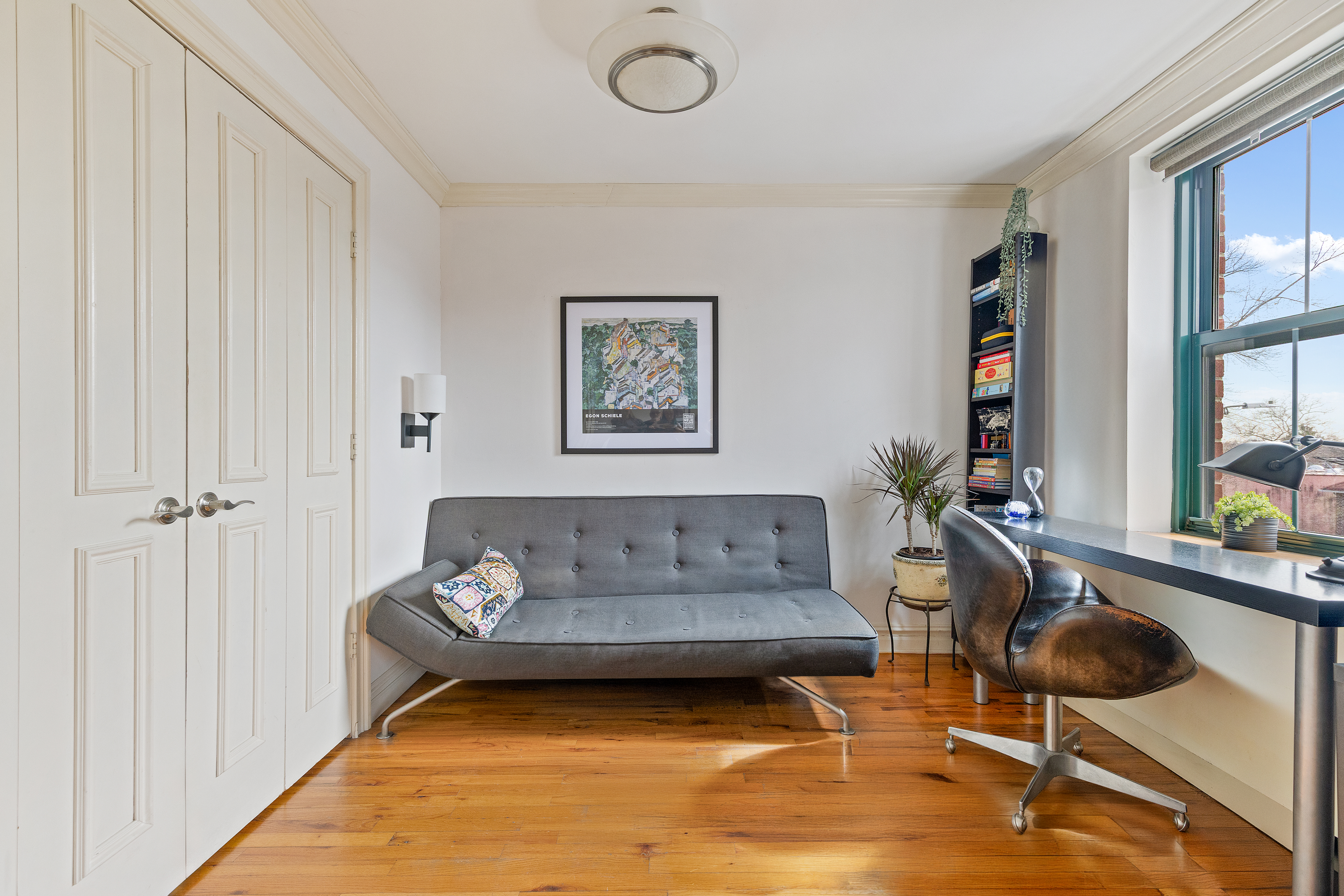 1139 Prospect Avenue, Unit 4G Brooklyn, NY 11218 - Photo 3 of 11 a living room with furniture and a rug