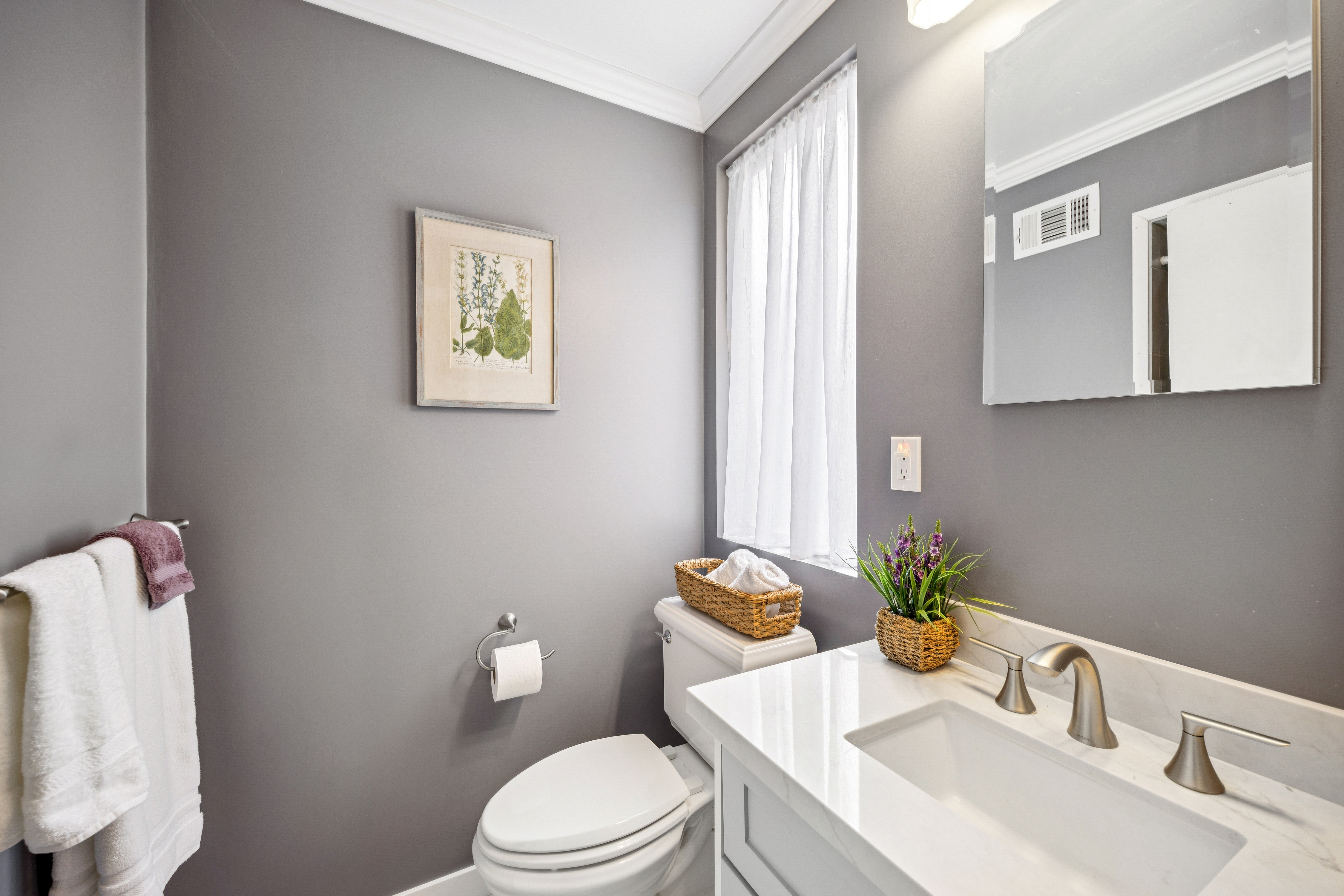 77 Bothin Road Fairfax, CA 94930 - Photo 16 of 32 a white toilet sitting next to a bathroom sink