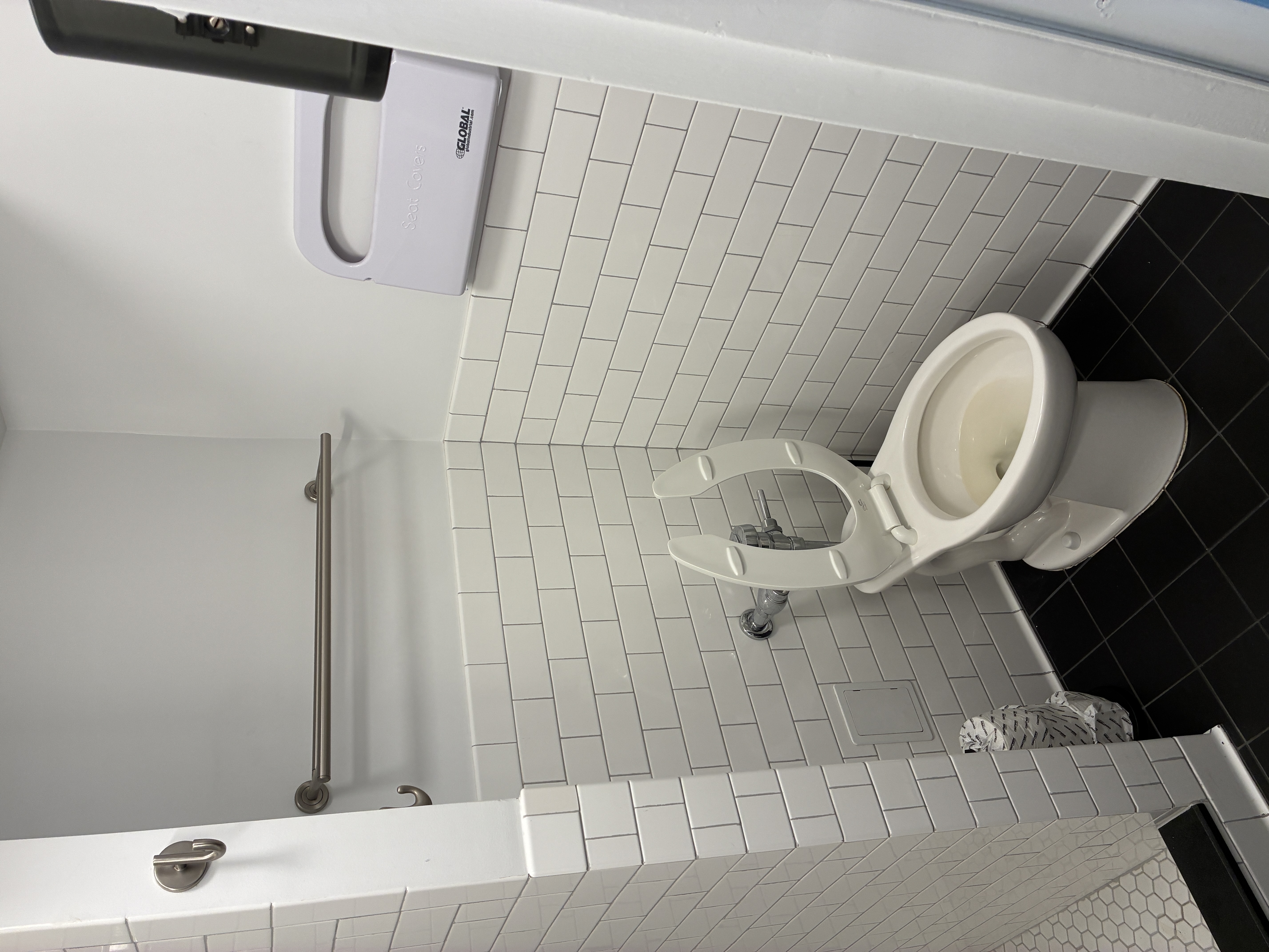 11 West 30th Street, Unit 2F Manhattan, NY 10001 - Photo 14 of 20 a bathroom with a toilet and a shower