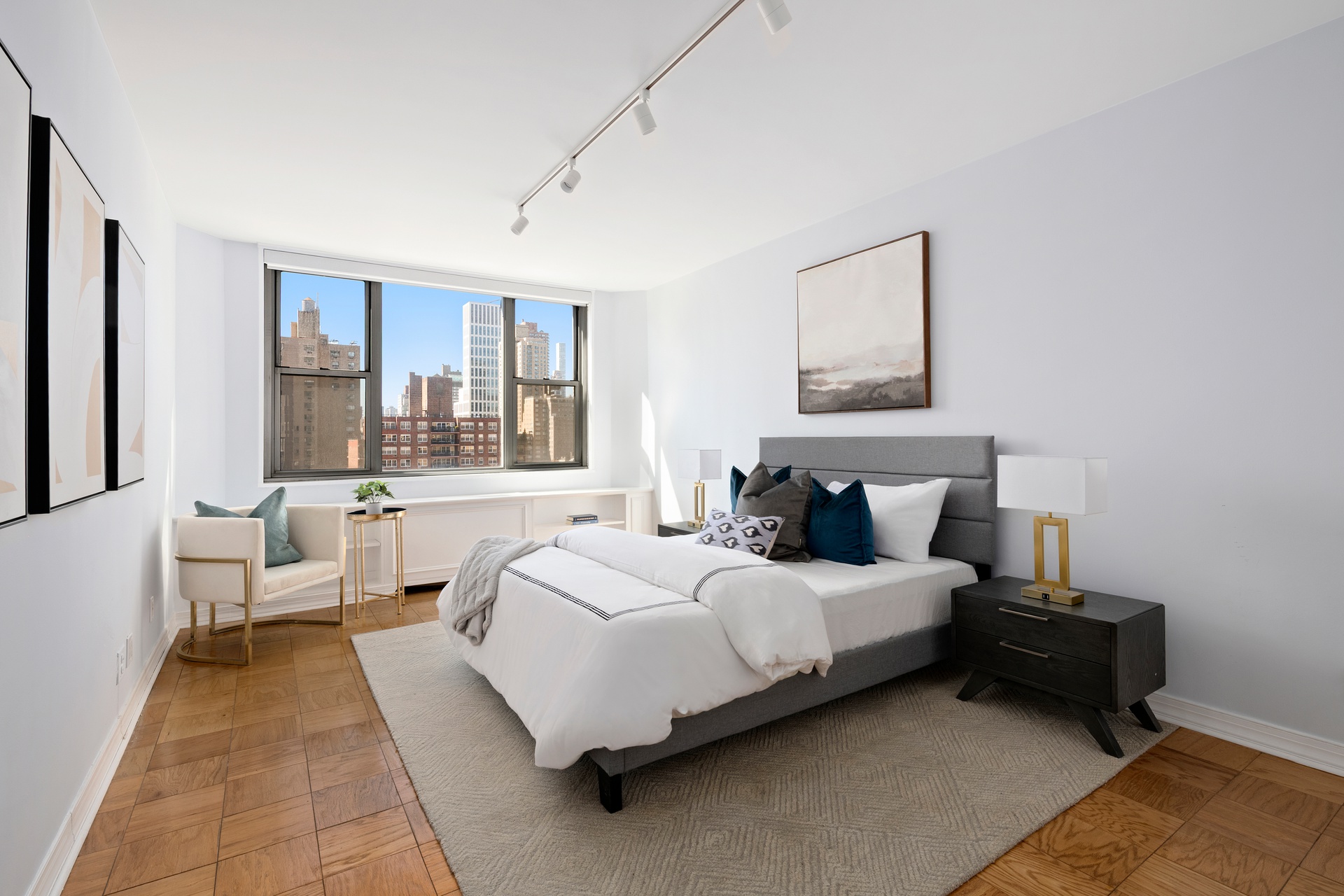 444 East 86th Street, Unit 14G Manhattan, NY 10028 - Photo 5 of 10 a bedroom with a bed and a large window
