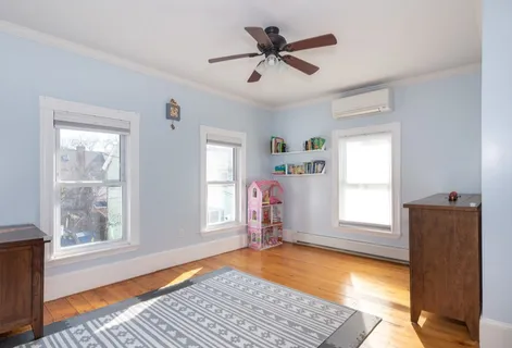 a view of livingroom with hardwood floor and window