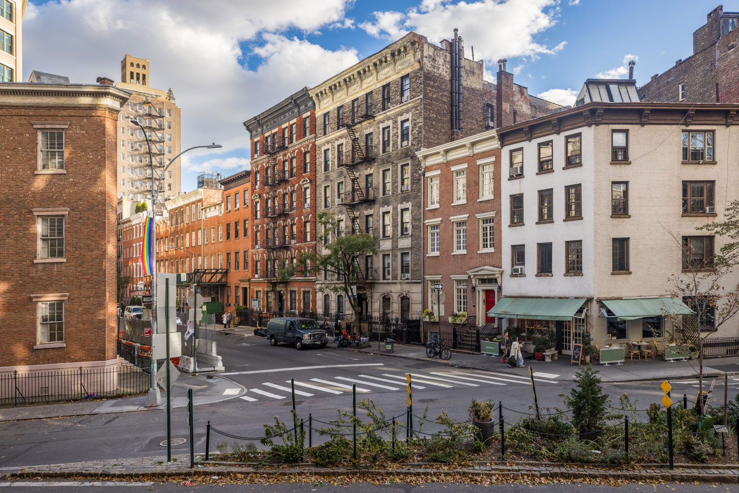 45 Christopher Street, Unit 2E Manhattan, NY 10014 - Photo 14 of 15 a city street lined with tall buildings