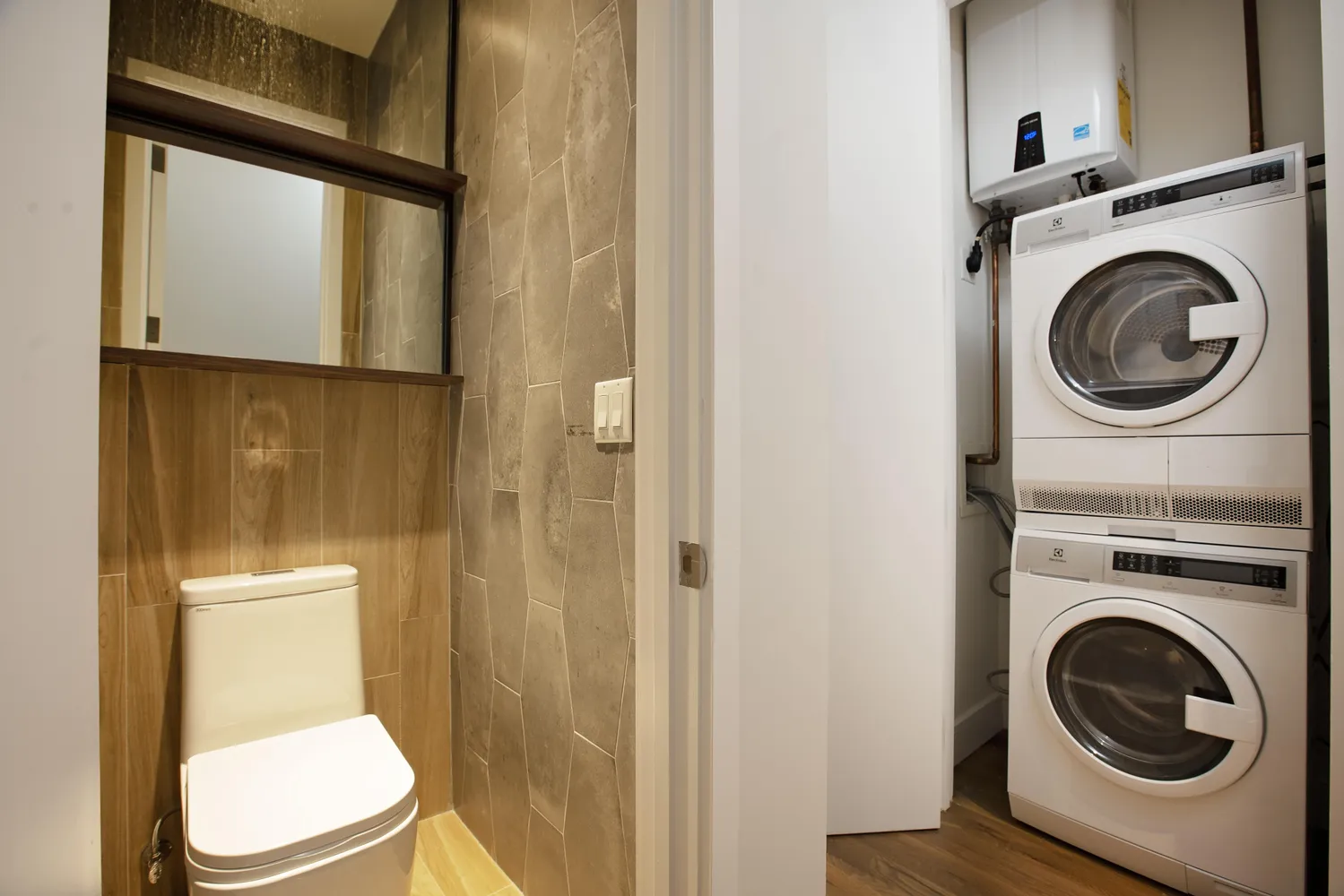 a bathroom with a toilet and a sink