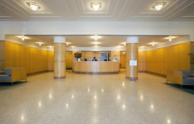 4-74 48th Avenue, Unit 34G Queens, NY 11109 - Photo 7 of 9 a view of a room with gym equipment