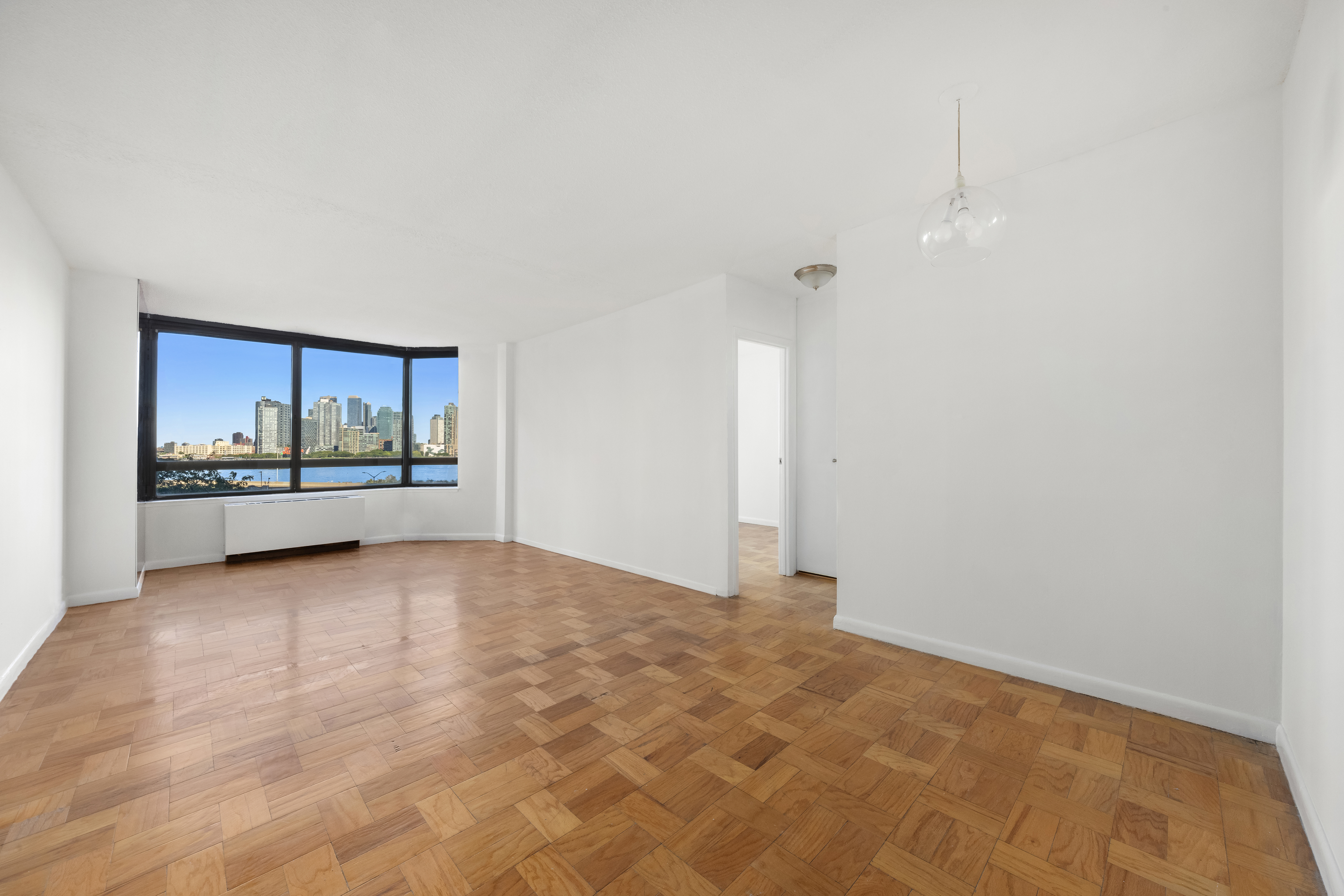 630 1st Avenue, Unit 6S Manhattan, NY 10016 - Photo 2 of 11 a view of a room with window and natural light