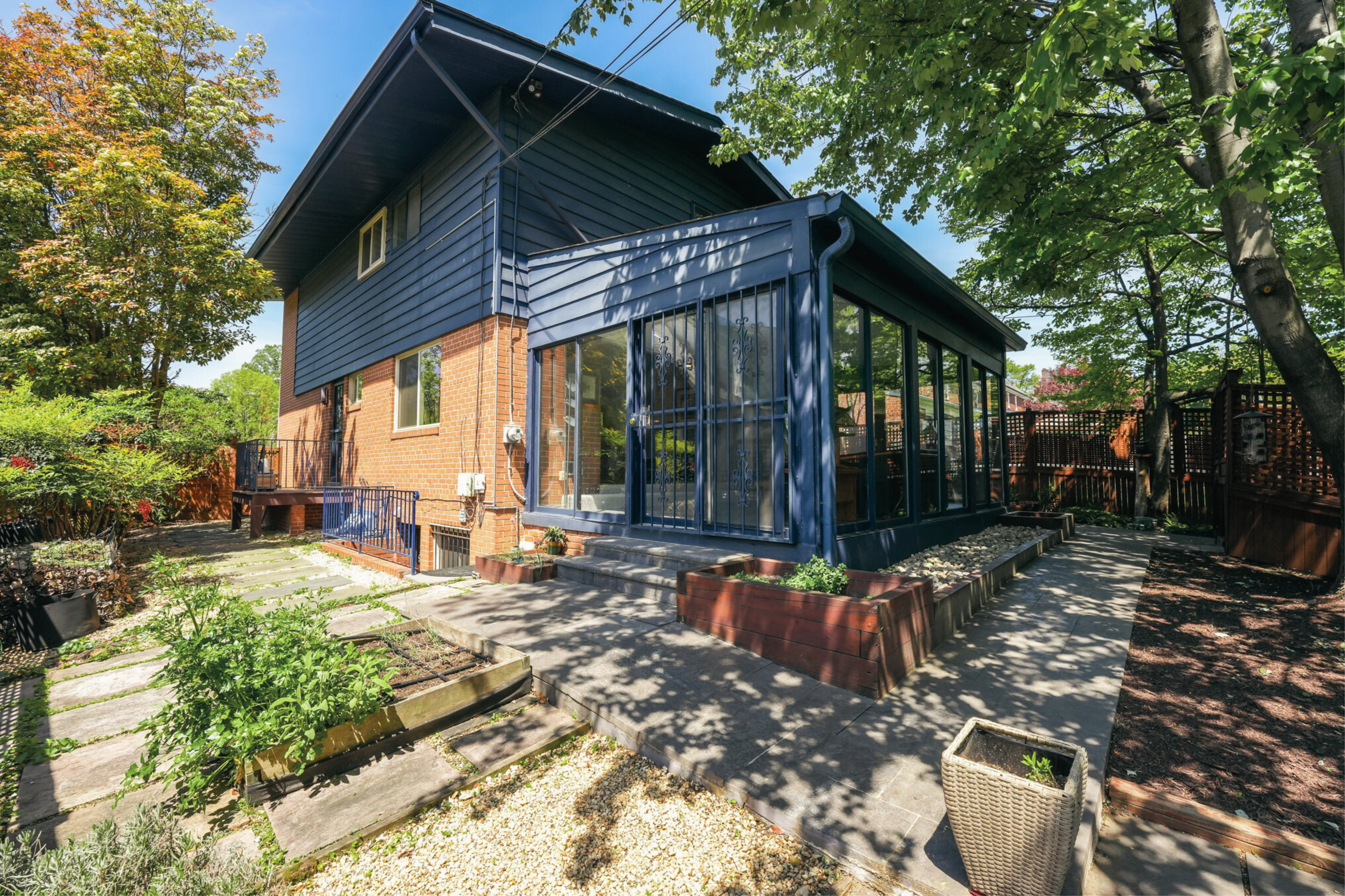 8003 16th Street Northwest Washington, DC 20012 - Photo 8 of 38 a view of a house with backyard sitting area and garden