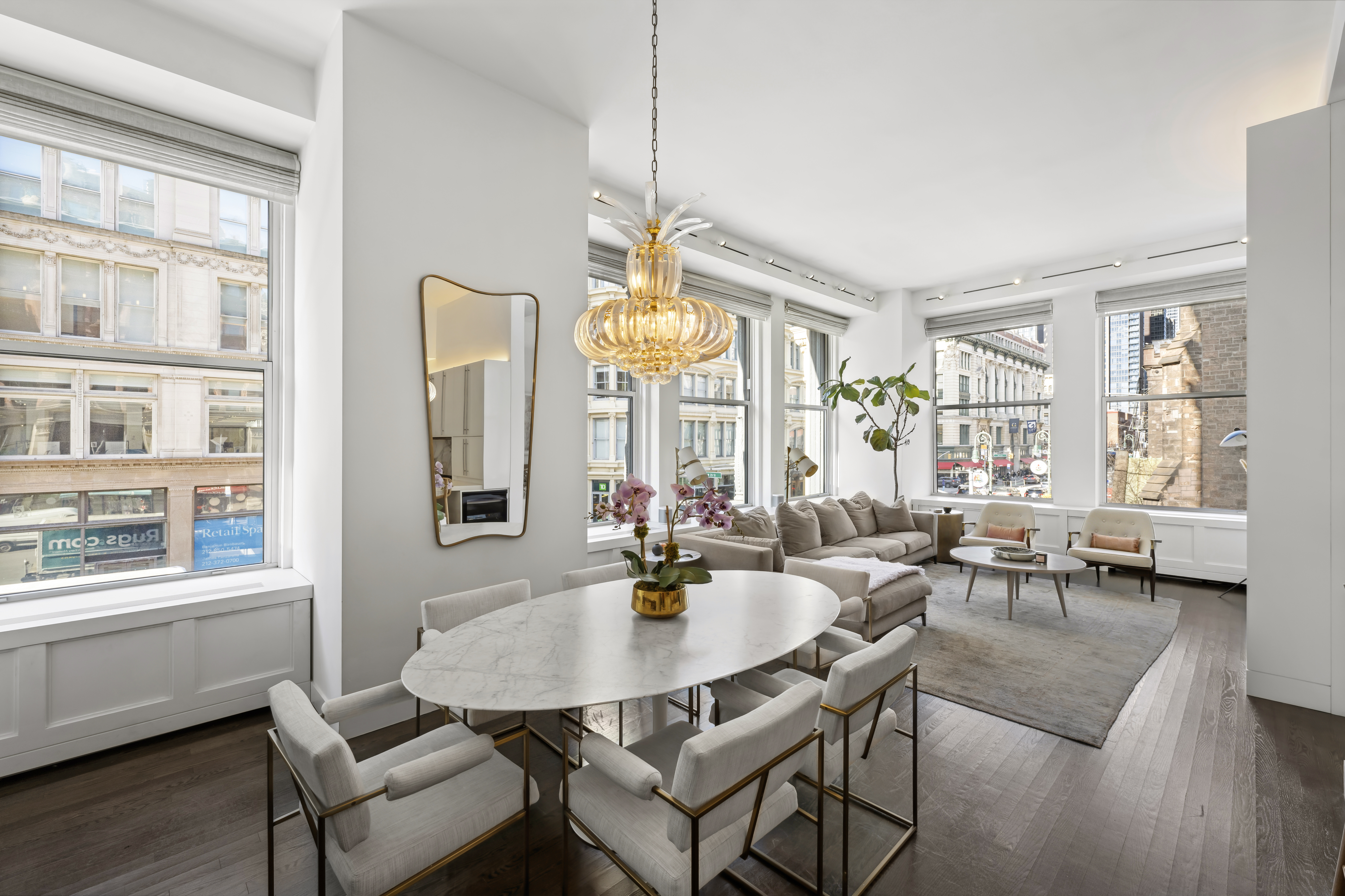 60 West 20th Street, Unit 2F Manhattan, NY 10011 - Photo 2 of 21 a dining room with furniture and wooden floor