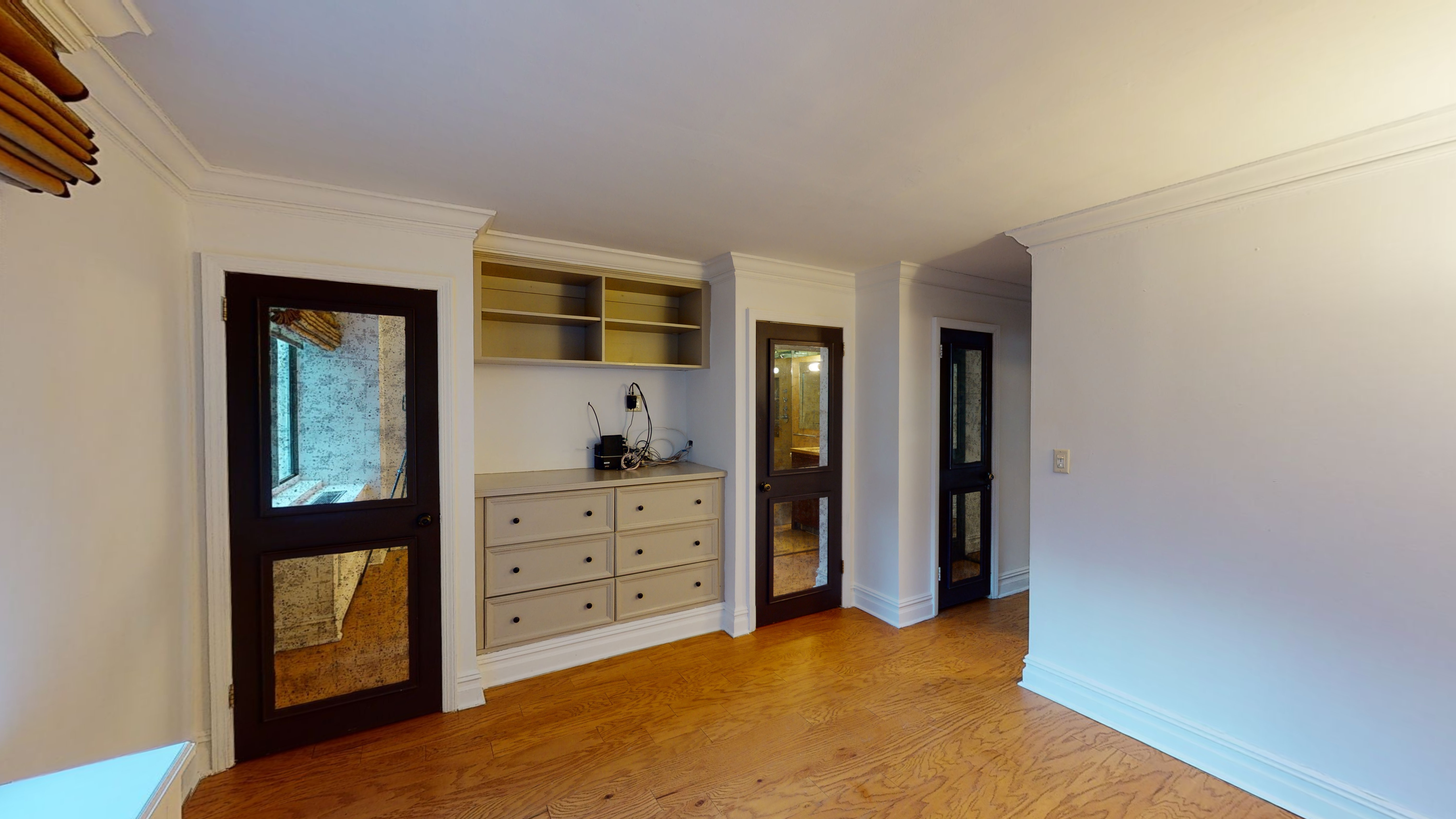 50 Lexington Avenue, Unit 4H Manhattan, NY 10010 - Photo 6 of 13 a view of room with cabinet and mirror