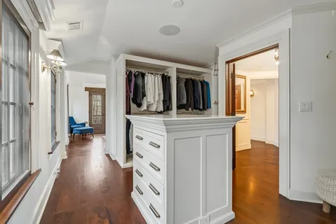 a kitchen with stainless steel appliances granite countertop a stove and a refrigerator