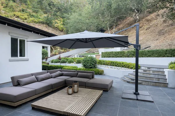 a view of a house with a couches and balcony
