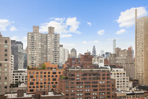 a view of a city that has tall building