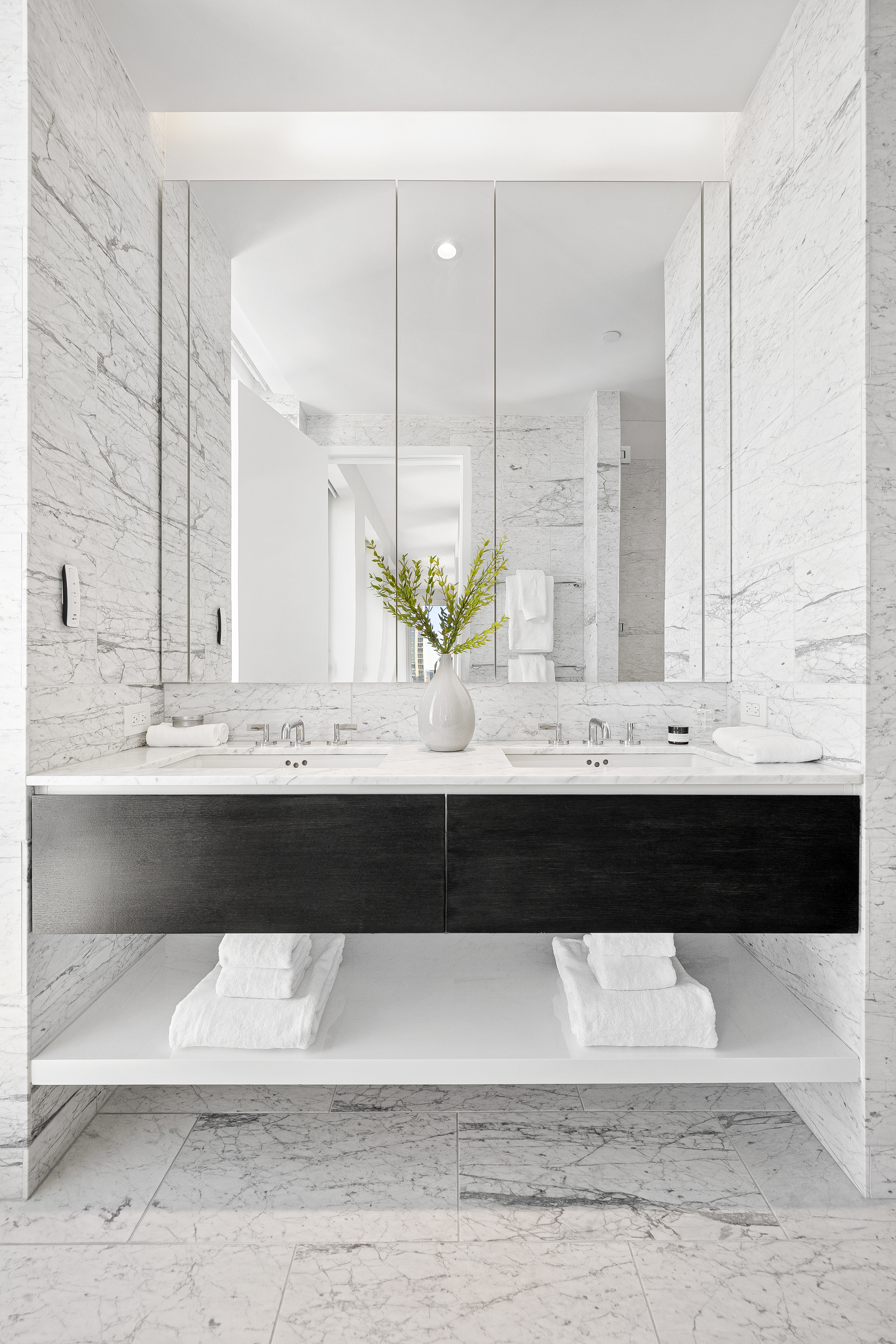 15 West 61st Street, Unit PH1C Manhattan, NY 10023 - Photo 18 of 26 a bathroom with a bathtub and a sink