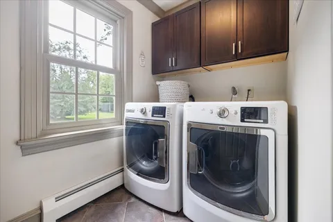 a view of swimming pool with a yard