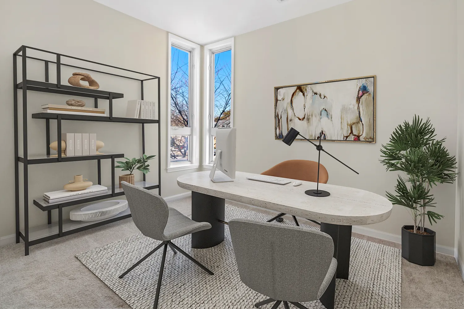 a room with furniture and a potted plant