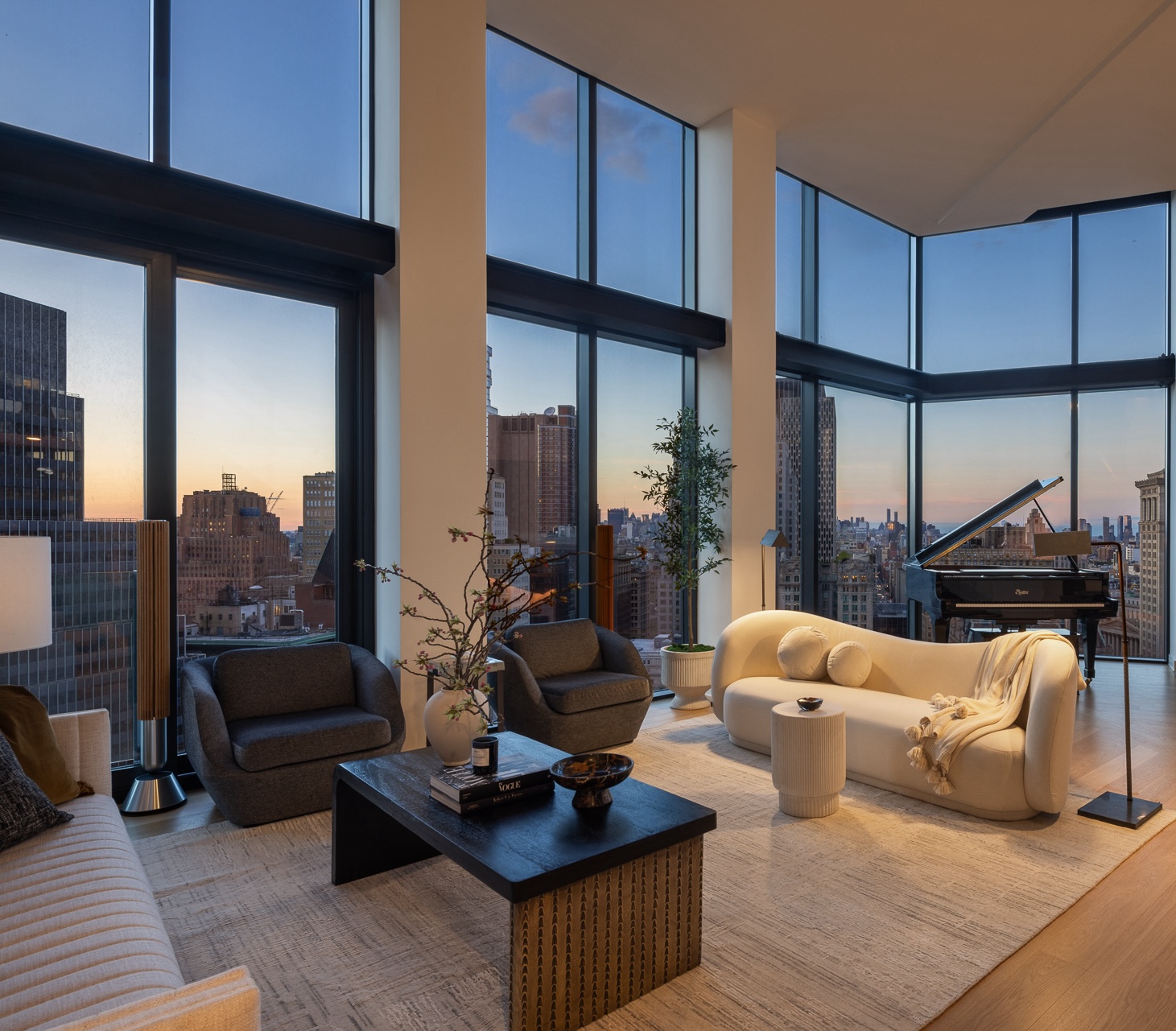 33 Park Row, Unit PH1 Manhattan, NY 10038 - Photo 3 of 15 a living room with furniture and a large window