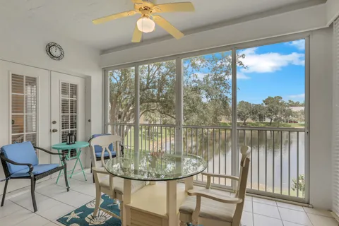 $420,500 | 680 Wiggins Lake Drive, Unit 202, Naples, FL 34110