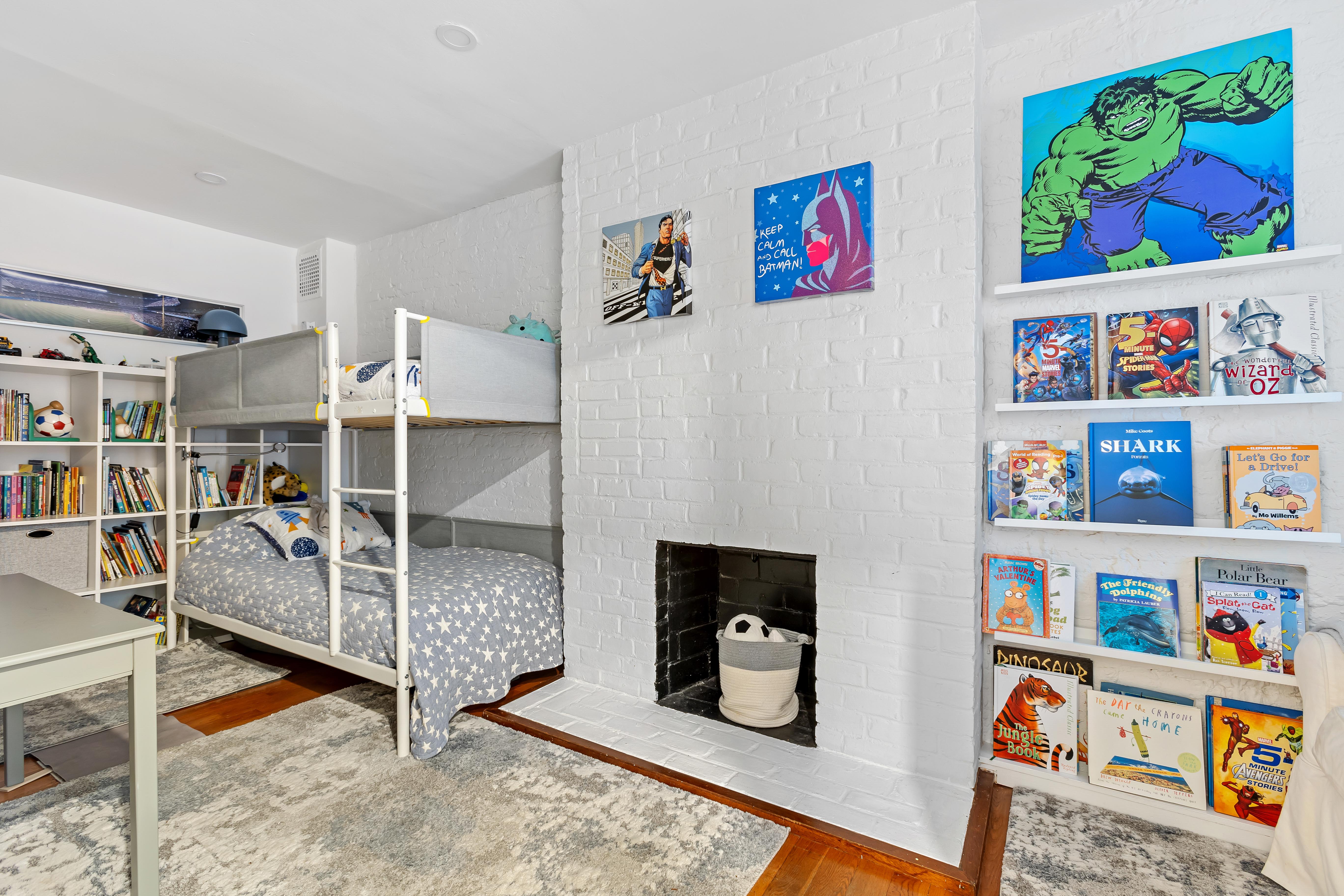 227 Garfield Place, Unit Garden Duplex Brooklyn, NY 11215 - Photo 10 of 15 a bedroom with furniture and a painting on the wall
