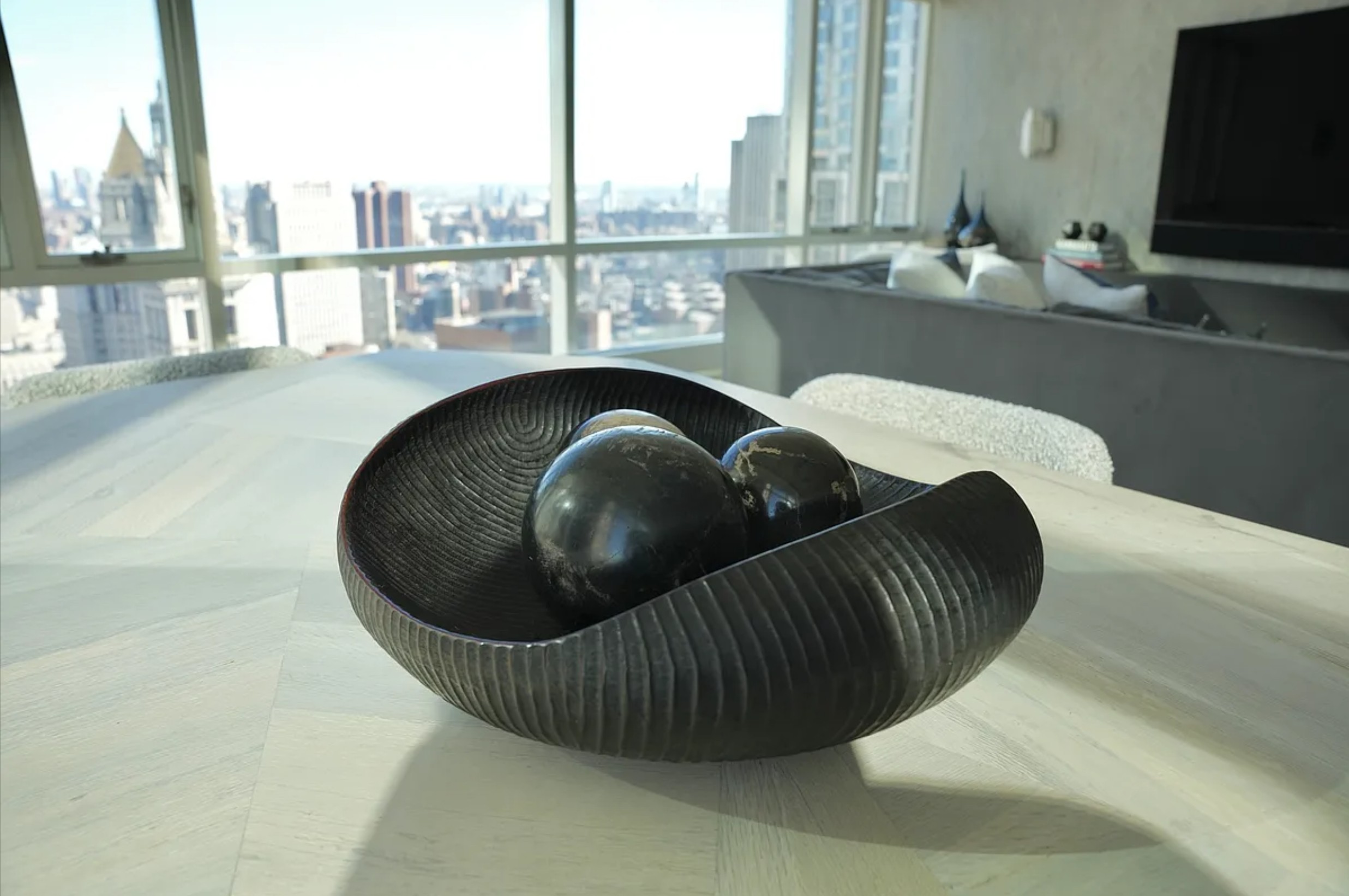 5 Beekman Street, Unit 43A Manhattan, NY 10038 - Photo 5 of 33 a living room with a large window and a couch