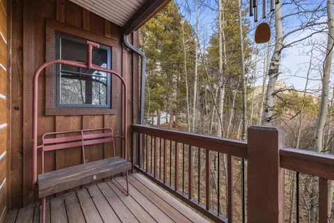 a view of a brick house with a large window