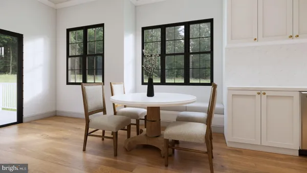 a dining room with furniture and window