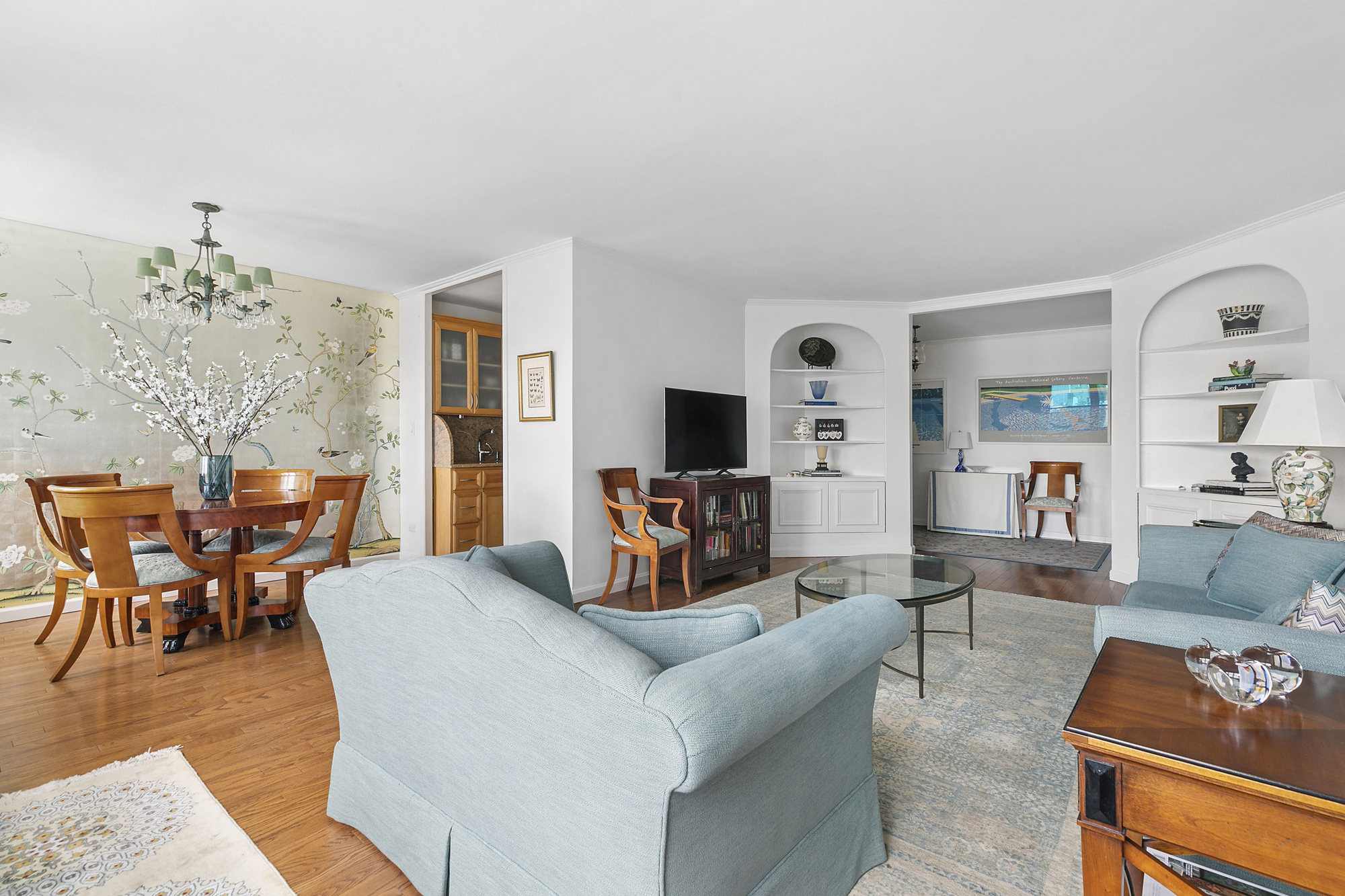 1199 Park Avenue, Unit 10K Manhattan, NY 10128 - Photo 3 of 12 a living room with furniture and wooden floor