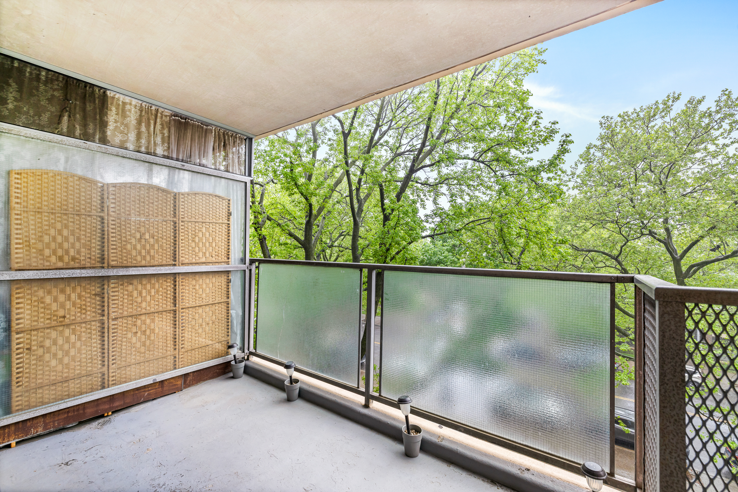 1065 Vermont Street, Unit 4L Brooklyn, NY 11207 - Photo 7 of 11 a view of a room with racks on the wall