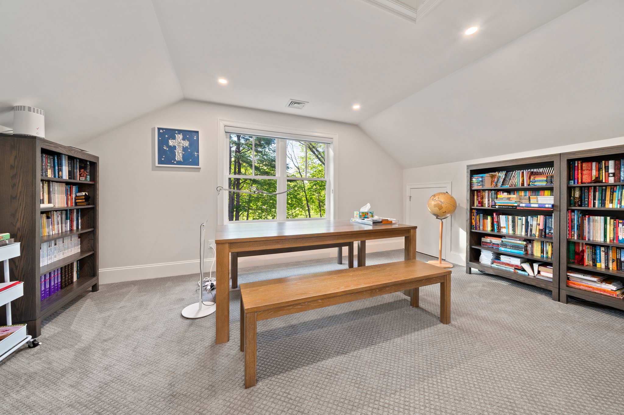 241 Lowell Road Wellesley, MA 02481 - Photo 51 of 85 a bedroom with furniture and a book shelf