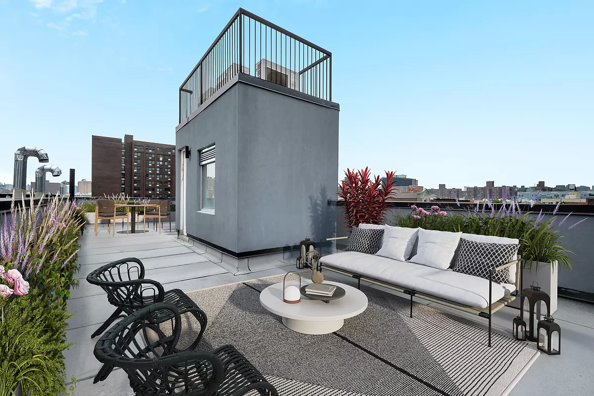 265 West 131st Street, Unit 6 Manhattan, NY 10027 - Photo 6 of 8 a view of a patio with couches and potted plants