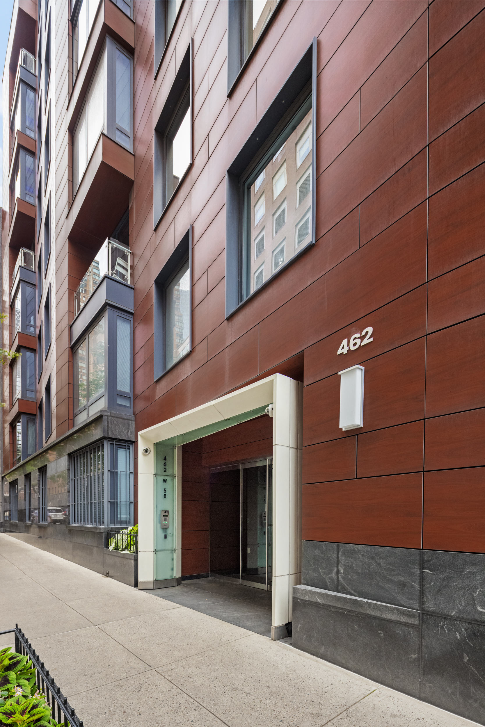 462 West 58th Street, Unit 9B Manhattan, NY 10019 - Photo 16 of 17 a view of a brick building