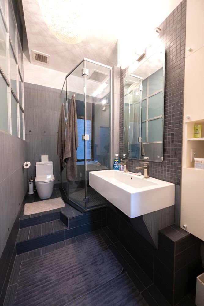 382 Lafayette Street, Unit 2 Manhattan, NY 10003 - Photo 10 of 19 a bathroom with a sink and mirror
