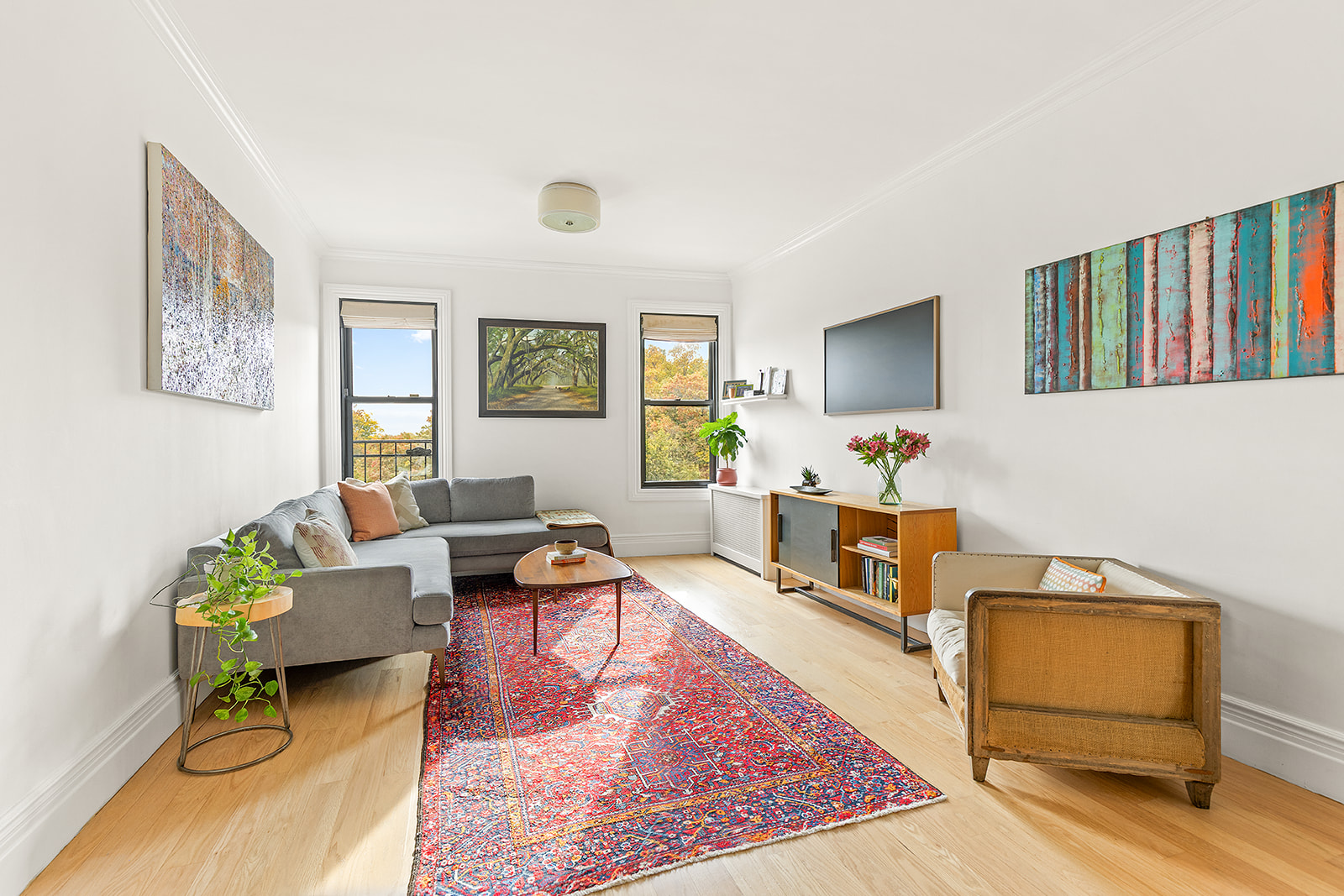 125 Eastern Parkway, Unit 6CK Brooklyn, NY 11238 - Photo 1 of 16 a living room with furniture and a window