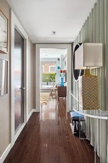 a view of livingroom with furniture and wooden floor