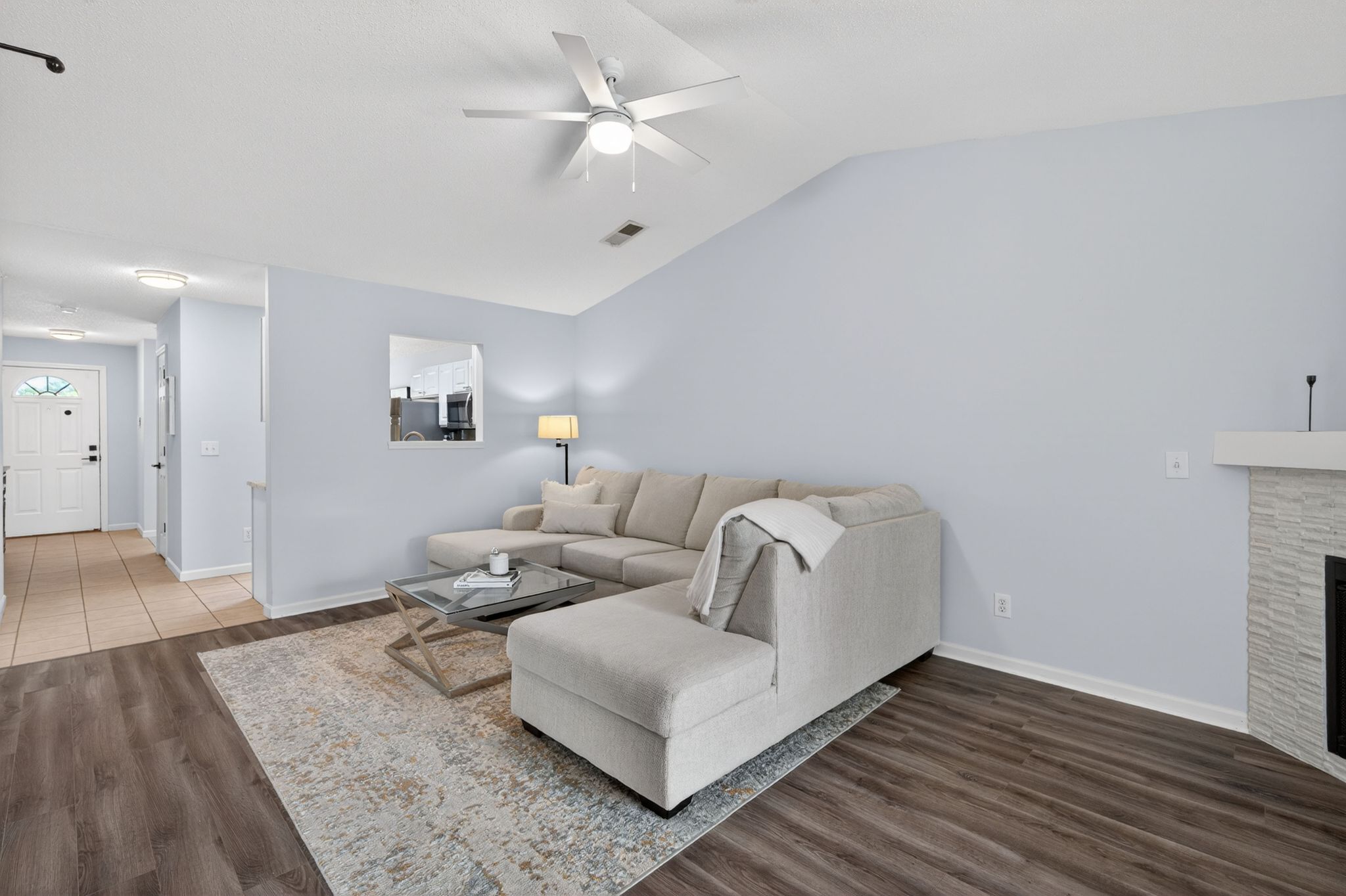 Huntscroft Lane Raleigh, NC 27617 - Photo 25 of 49 a living room with furniture and a wooden floor