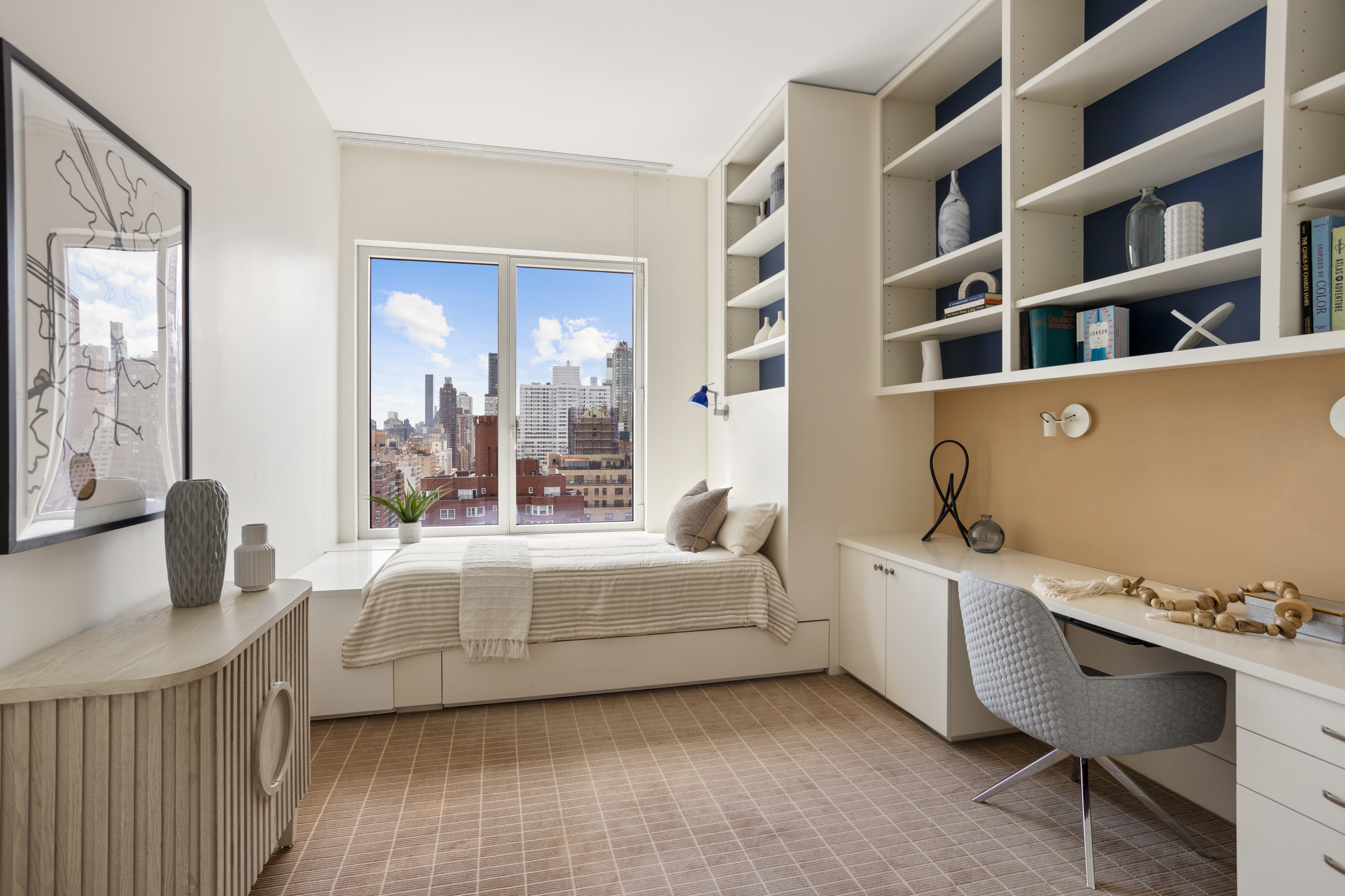 255 East 74th Street, Unit 21B Manhattan, NY 10021 - Photo 18 of 40 a living room with furniture and a window
