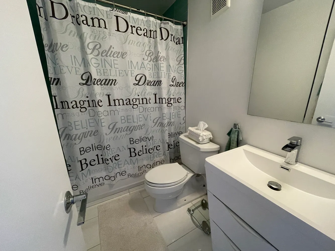 a bathroom with a sink and a toilet