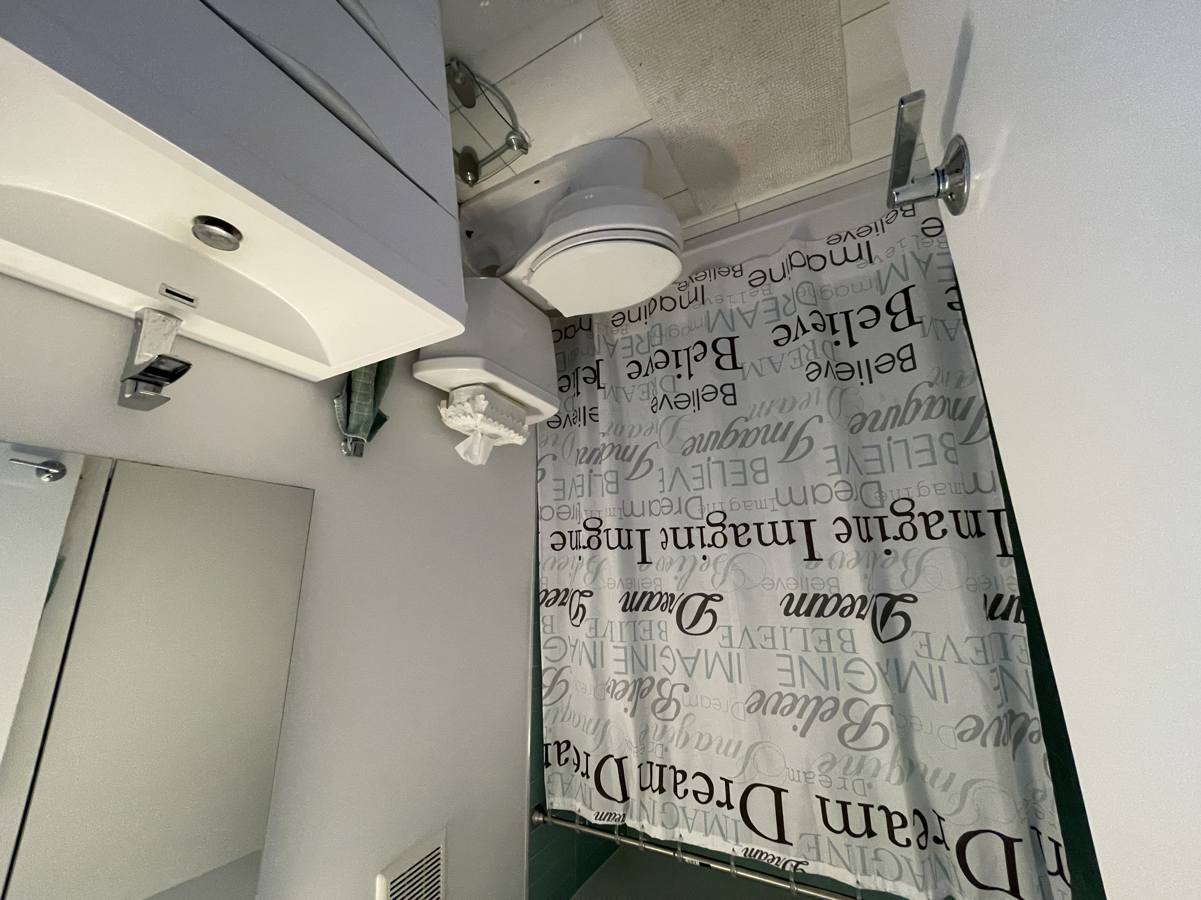 25-40 Shore Boulevard, Unit 15T Queens, NY 11102 - Photo 10 of 24 a bathroom with a sink and a toilet