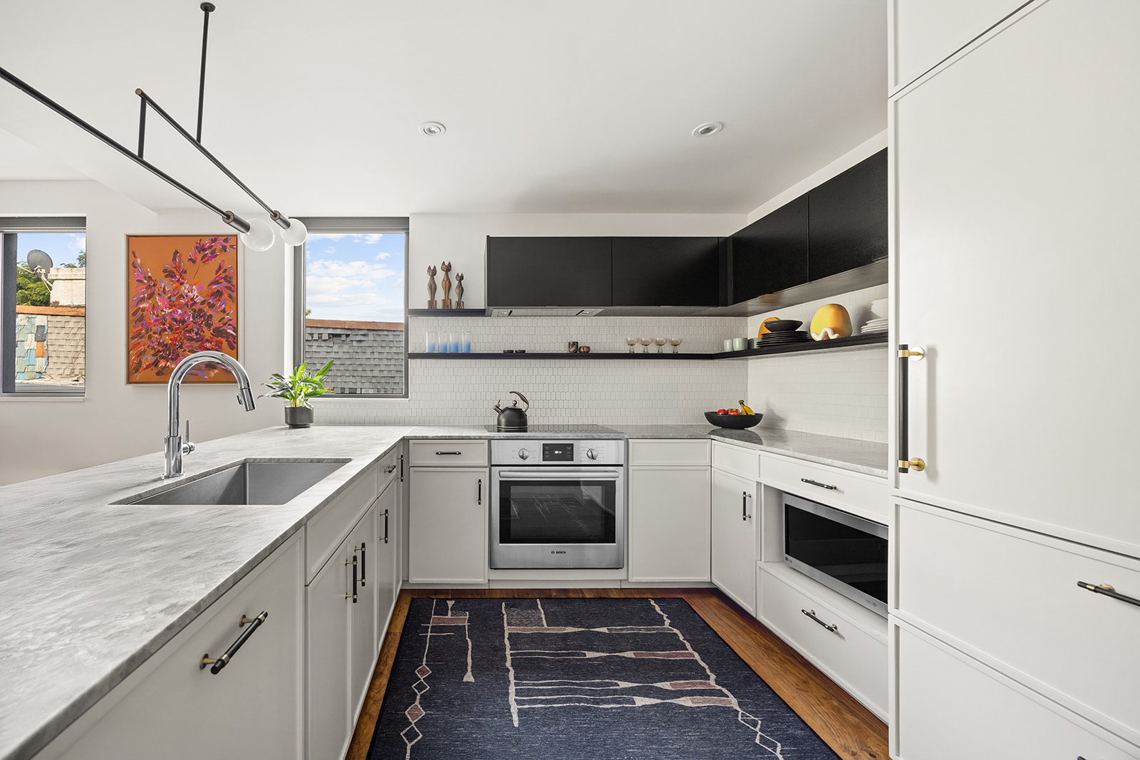 305 23rd Street, Unit 3W Brooklyn, NY 11215 - Photo 6 of 21 a kitchen with a sink stove and microwave