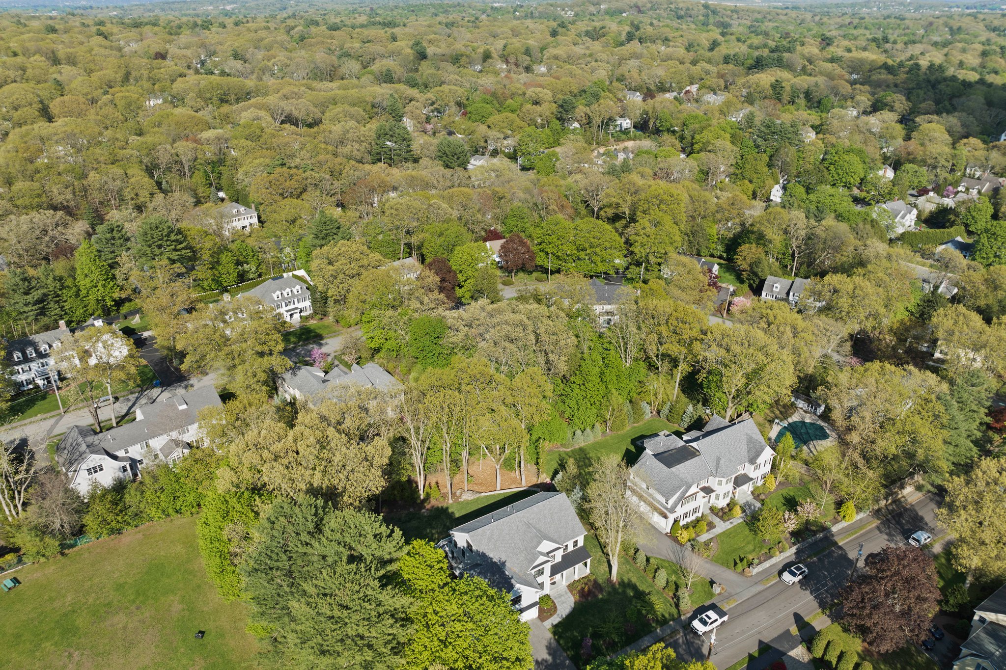 241 Lowell Road Wellesley, MA 02481 - Photo 78 of 85 an aerial view of a residential houses with yard