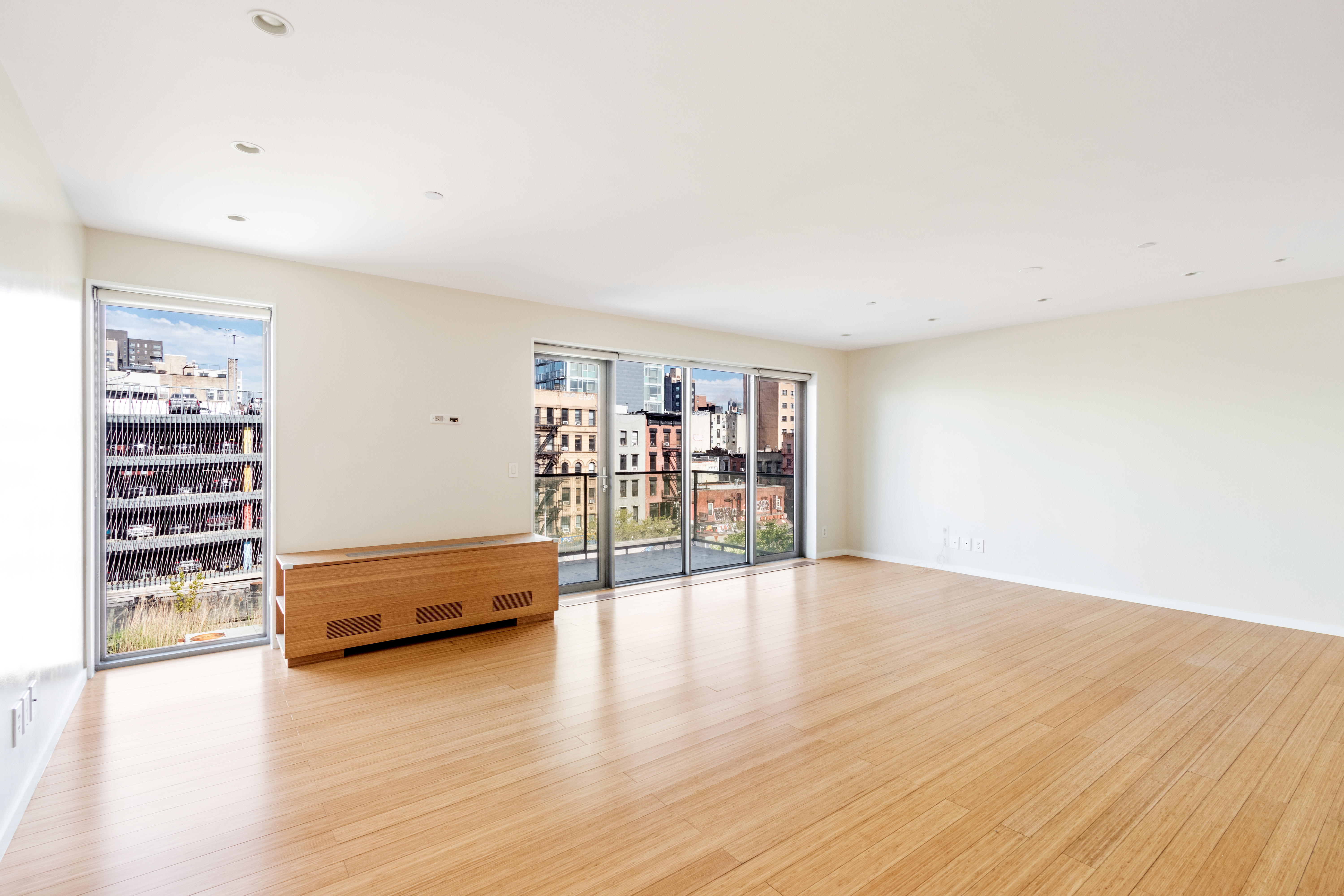 109 Norfolk Street, Unit 5 Manhattan, NY 10002 - Photo 2 of 14 a view of livingroom with furniture and wooden floor