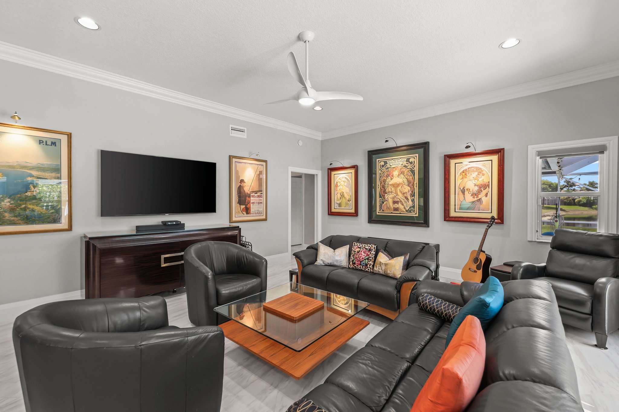 20317 Hacienda Court Boca Raton, FL 33498 - Photo 24 of 100 a living room with furniture and a flat screen tv