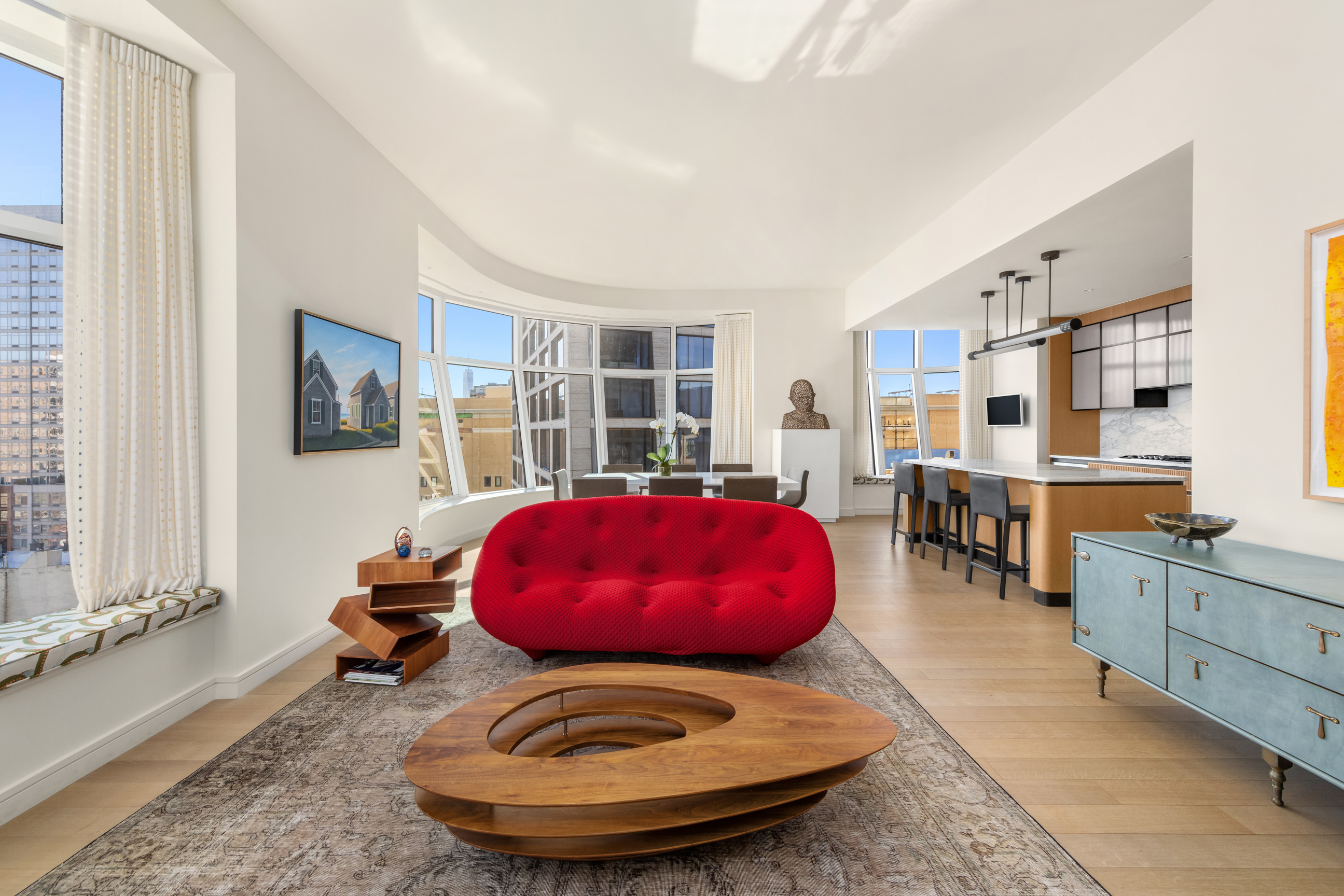 515 West 18th Street, Unit 1102 Manhattan, NY 10011 - Photo 3 of 18 a room with furniture and large windows