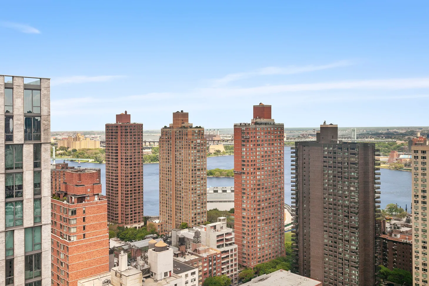 a view of a city with tall buildings