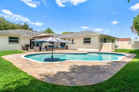 a view of a backyard with plants