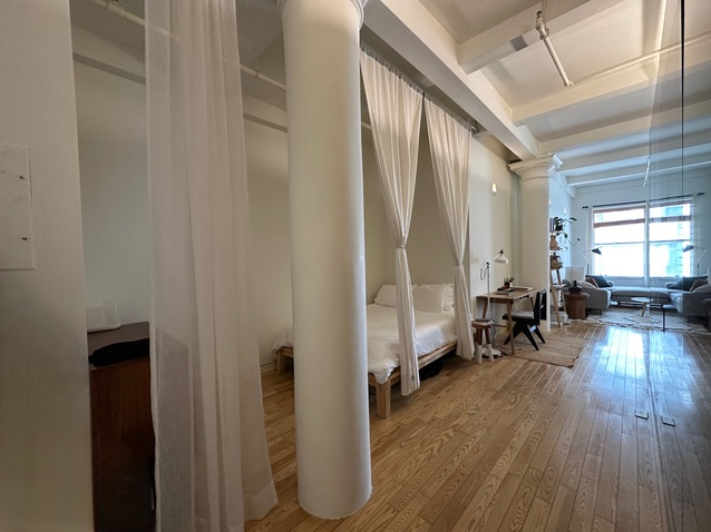 16 West 19th Street, Unit 8B Manhattan, NY 10011 - Photo 6 of 19 a living room with furniture and wooden floor