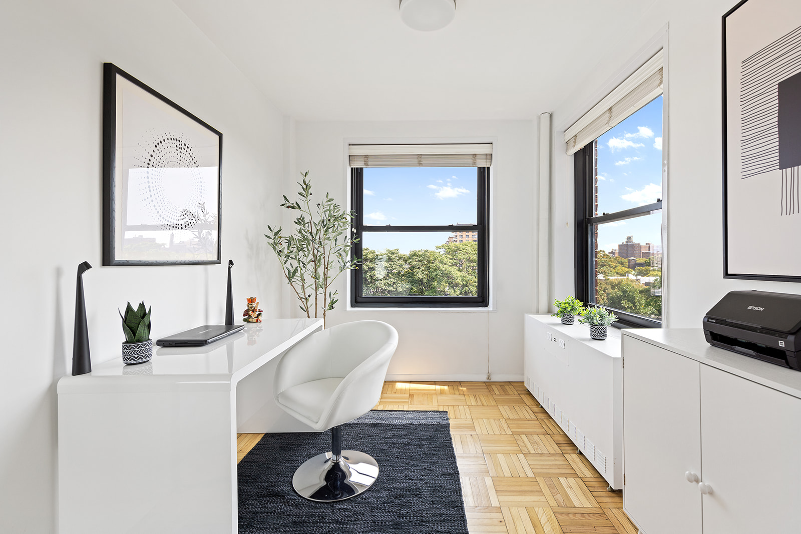 193 Clinton Avenue, Unit 9E Brooklyn, NY 11205 - Photo 7 of 9 a living room with furniture and a window