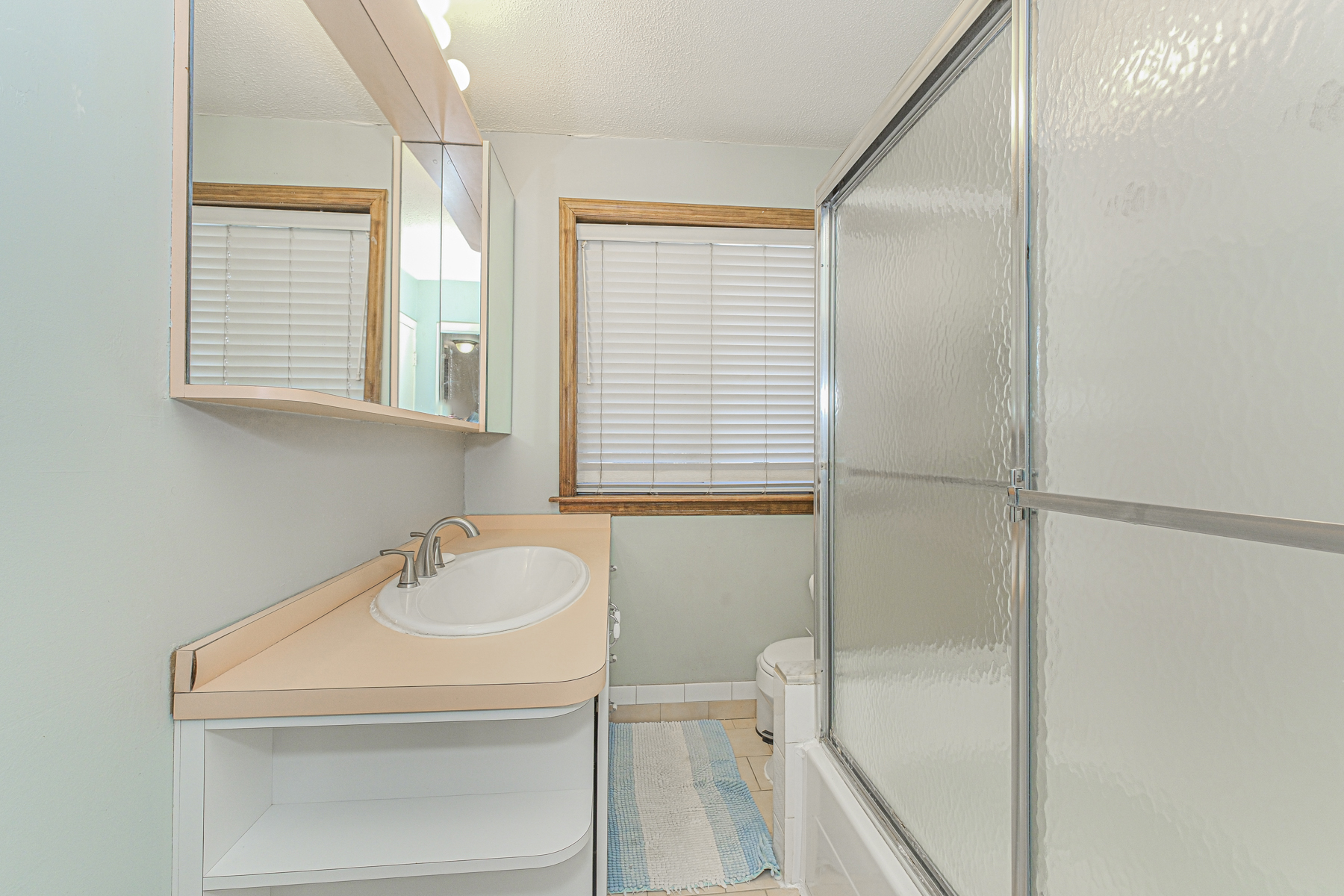 97 Dogwood Lane Staten Island, NY 10305 - Photo 7 of 22 a bathroom with a sink and a vanity