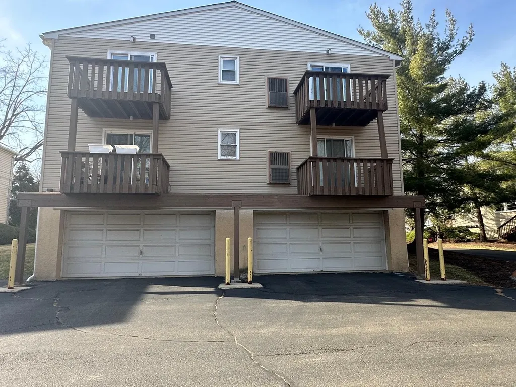 a front view of a house with a garage